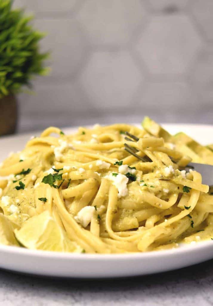 bowl of faintly green pasta.