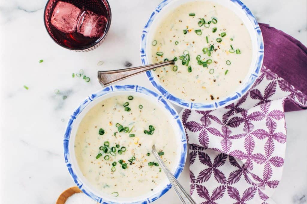 two bowls of corn chowder.