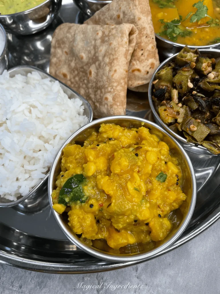 tray of curries and rice.