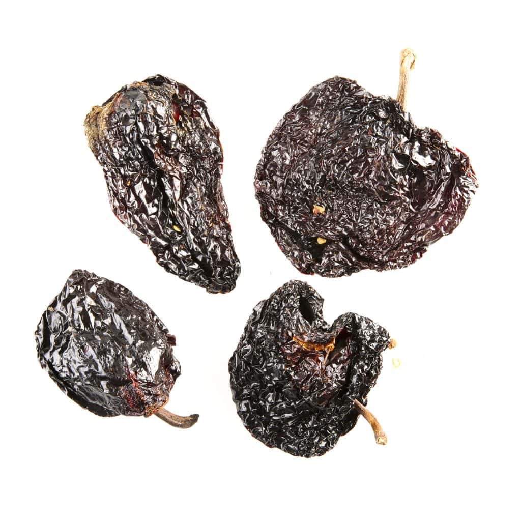 four dried ancho chilis.