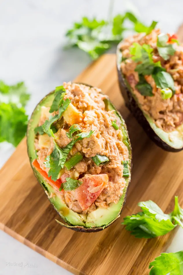 avocado halves stuffed with tuna mix.