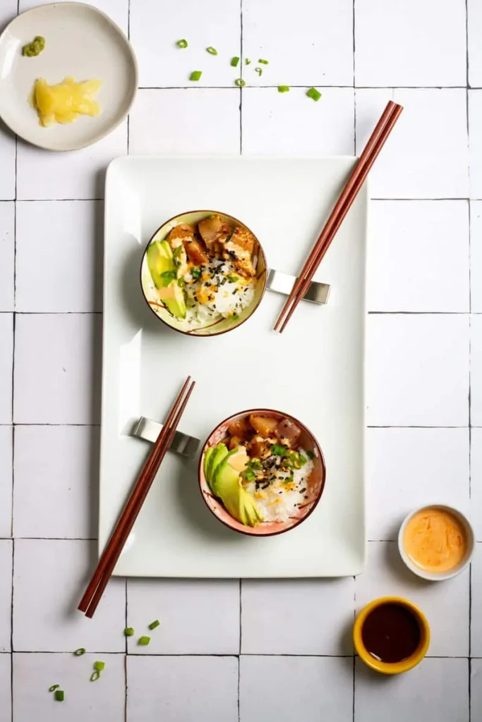 small bowls of tuna poke on a counter.