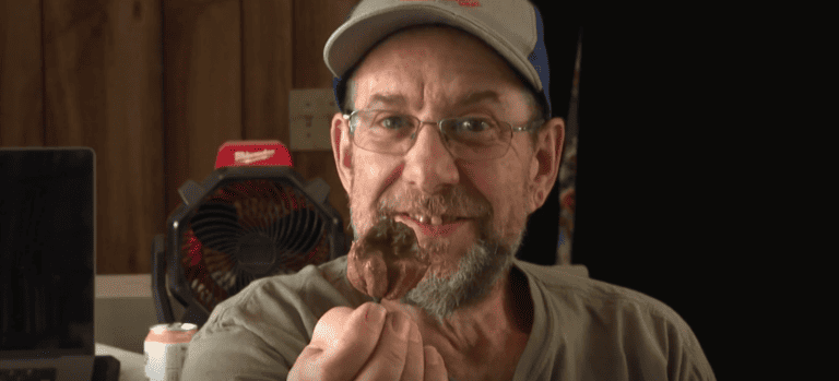 ed currie holding up a pepper X pepper.