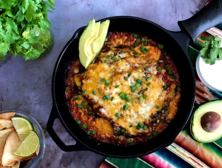 skillet filled with chile rellenos.